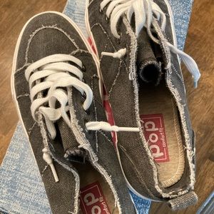 New … never worn. Pop brand women’s sneakers. Gray vintage worn look with laces.